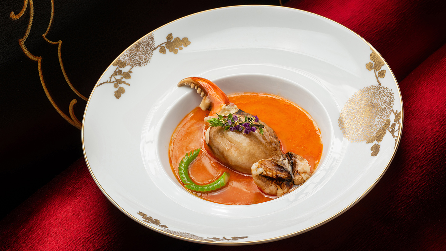 A Whole Fresh Crab Claw served with steamed Lobster Broth Egg White